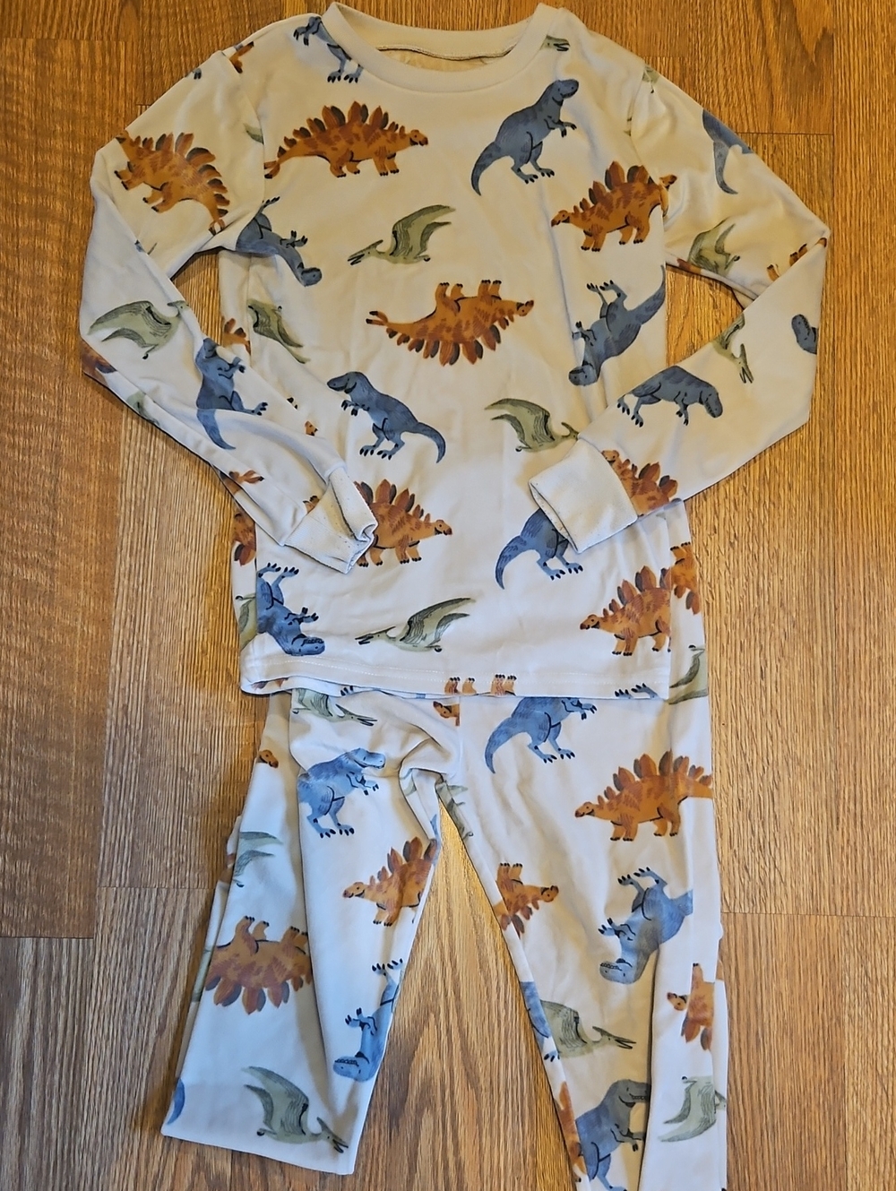 Carter's Cream Dinosaur Pajama Set with Blue, Green & Brown Prints